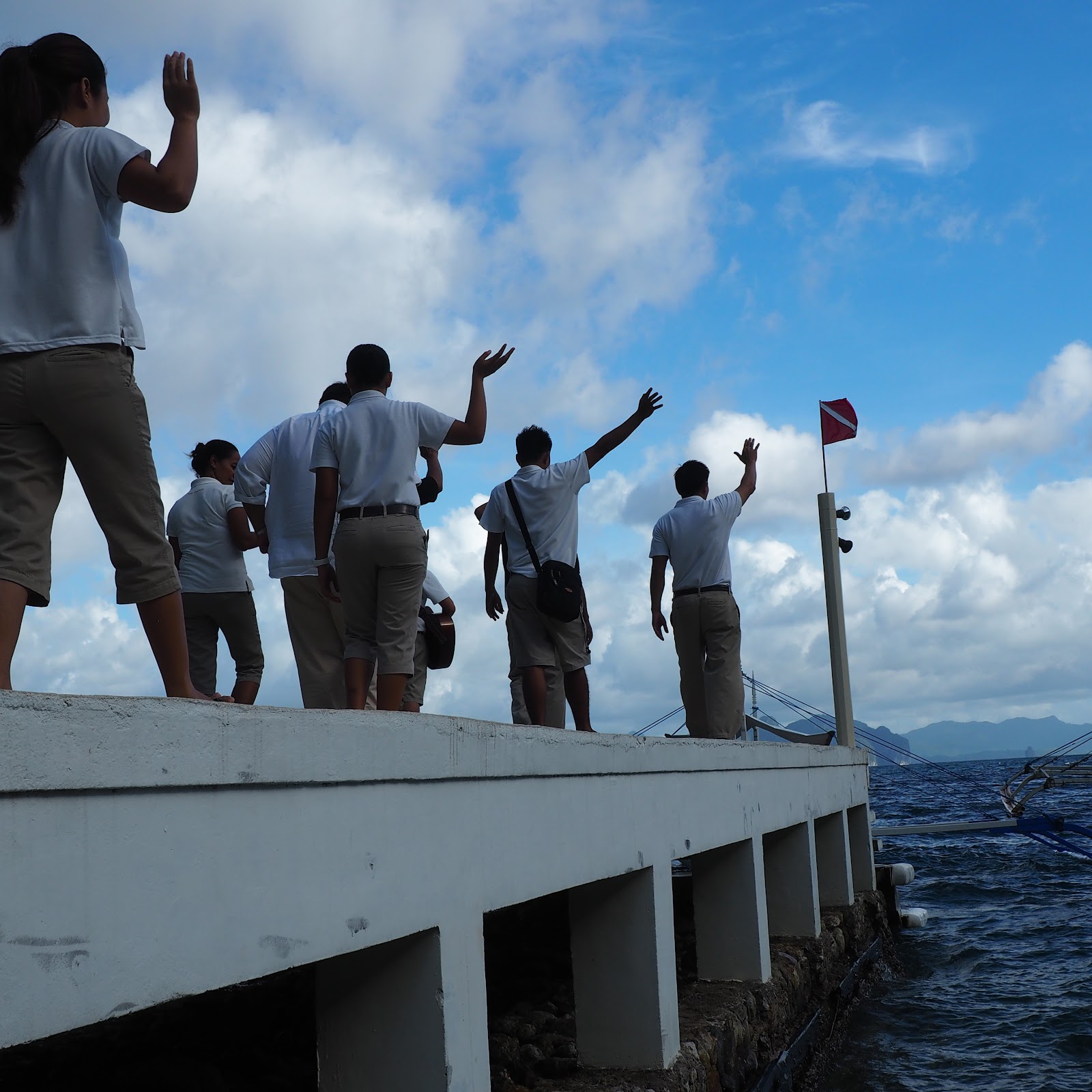 Miniloc Island Staff waving guests off