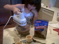 Suzie weilding mixer and our "muffin" mix!