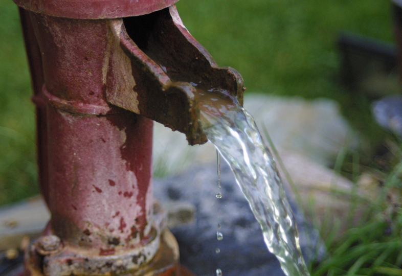 trying to take a sip of water from a fire hose trying to take a sip of water from a fire hose