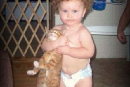 funny-kid-choking-cat1-445x299.jpg