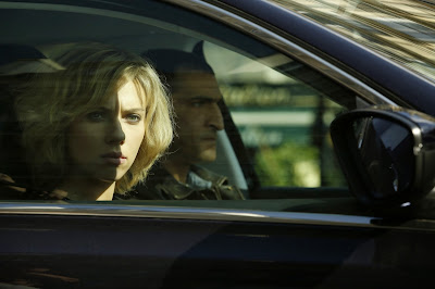 Scarlett Johansson and Amr Waked in Lucy