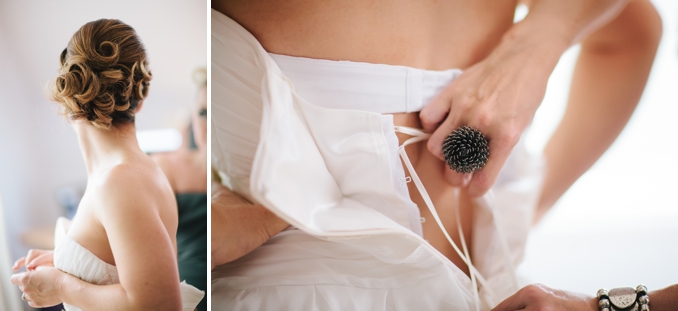 Gorgeous bride getting laced up into her dress - photos by STUDIO 1208