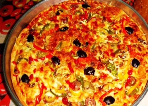 طريقة عمل البيتزا طريقة عمل البيتزا