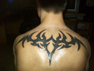 tattoos on back for guys. tribal back tattoos for guys