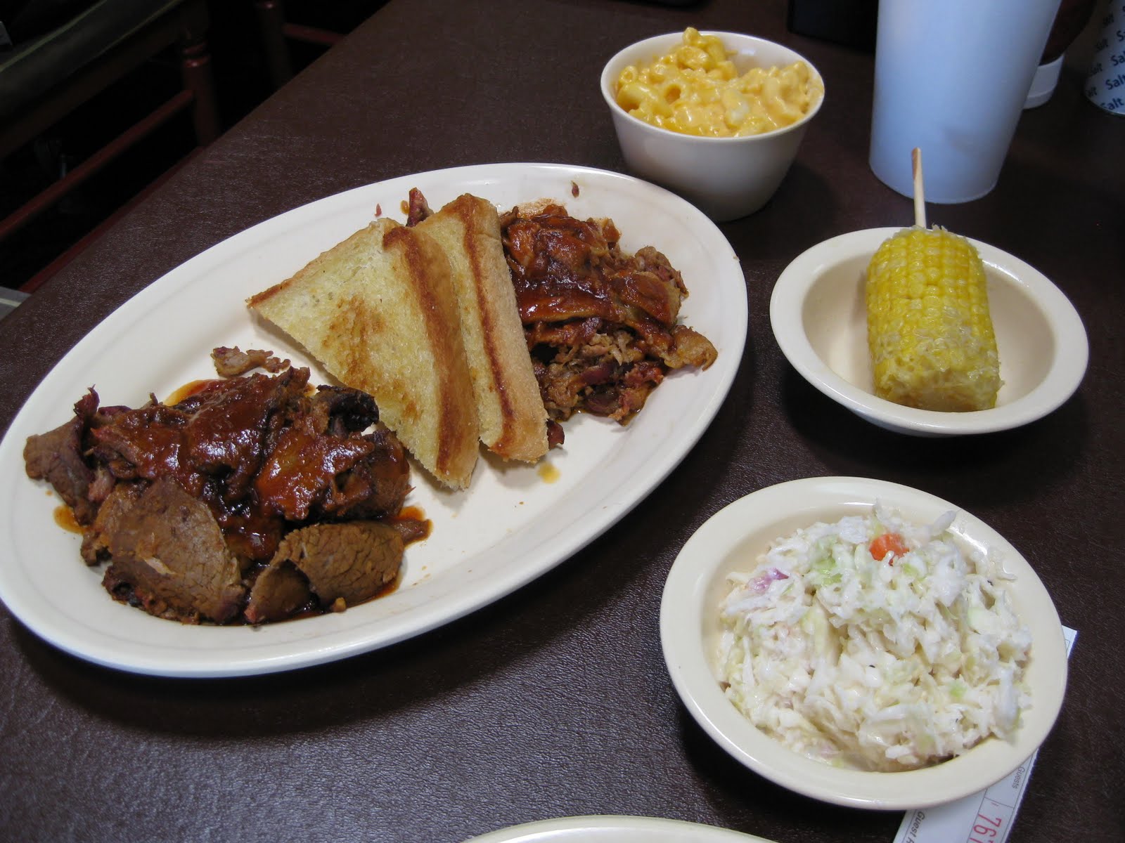 Brothers Sharing Meat Mr. Powdrell’s Barbecue (Albuquerque, NM)