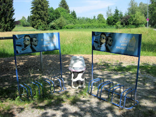 Bike racks featuring cigarette ads at a café near Lustenau, Austria