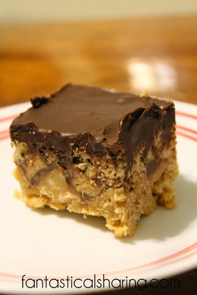 Peanut Butter Lover's Rice Krispie Treats | Blow your family and friends' minds with these peanut butter packed treats!