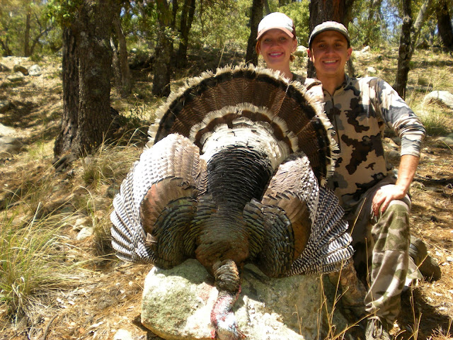 Heather+and+Tyler+with+Goulds+Turkey+on+Rock.jpg