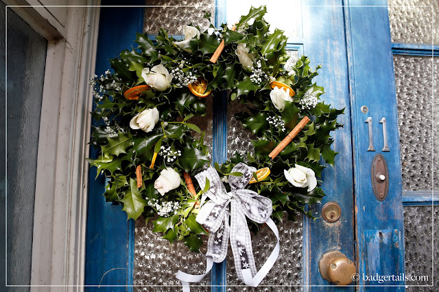 Hand Decorated Holly Christmas Wreath Hanging on Door