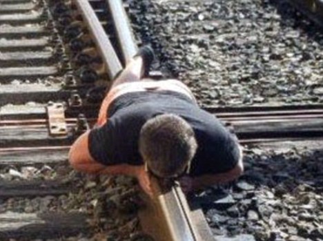 Teenager charged with trespassing on railway - after planking photo ends up on Facebook