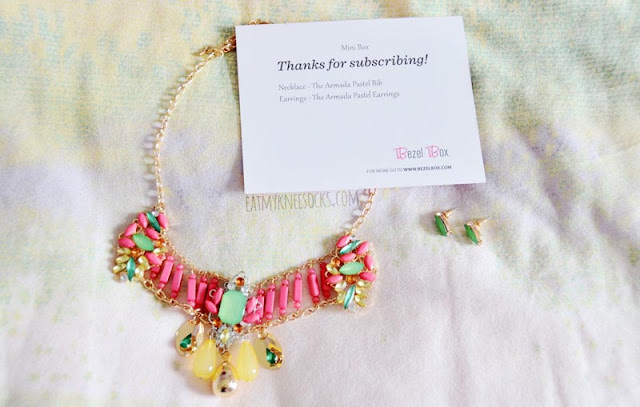 Bezel Box Mini Review: Jewelry Subscription Box - Armada Matching Set My first Bezel Box Mini came with the Armada Pastel bib necklace and matching Armada Pastel earrings.