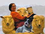 Island armchair reads with companions, dog&sheep