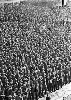 Black and White photo of a vast crowd of captured soldiers