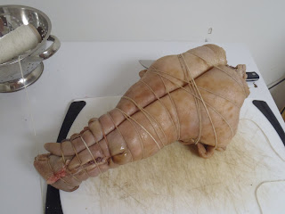 The wrapped pig's head, from the bottow