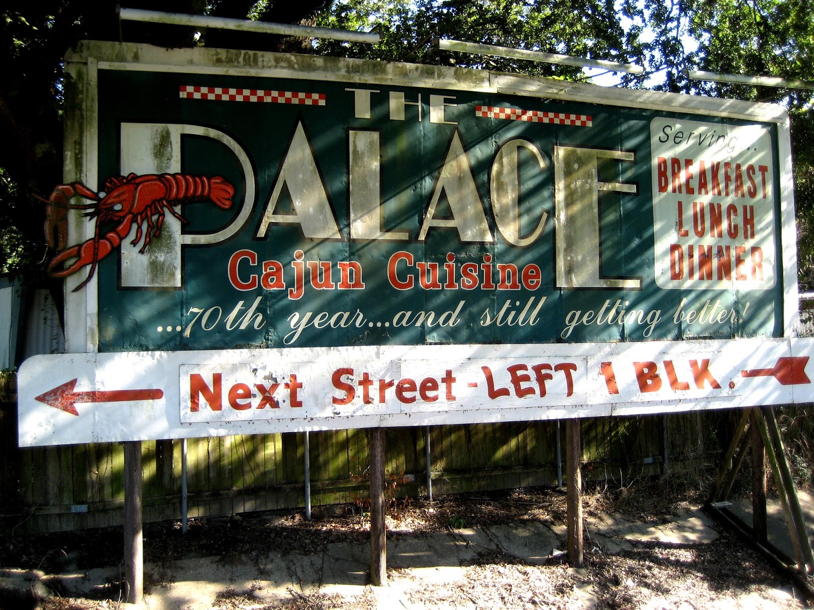 Living Rootless Opelousas The Palace Café Sign