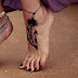 BLACK FEATHER TATTOO ON FOOT 