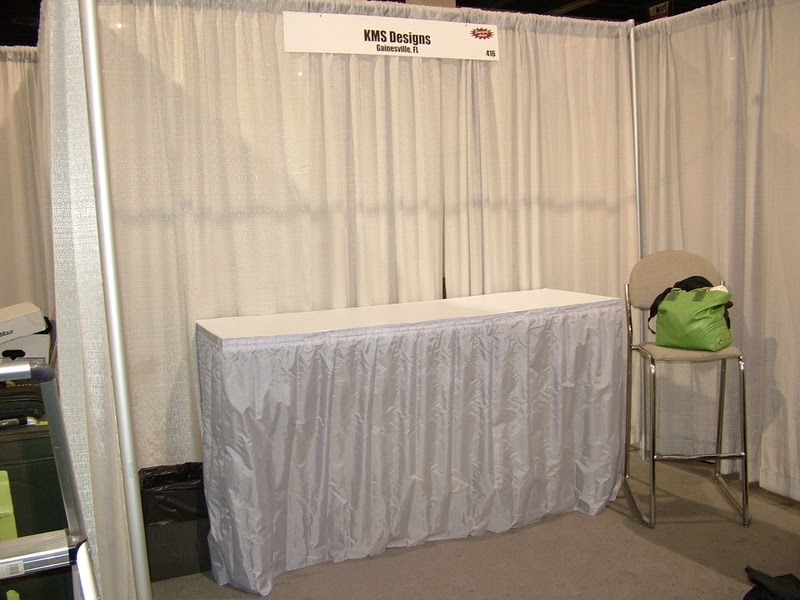 handmade resin jewelry by Katherine Swift Resin jewelry booth at ACRE