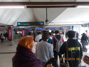 Queueing at the "Immigration Counter" at Velana International airport on Hulhule' Island.