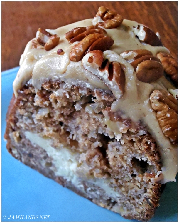 Jam Hands Apple and Cream Cheese Bundt Cake with Caramel Pecan Topping