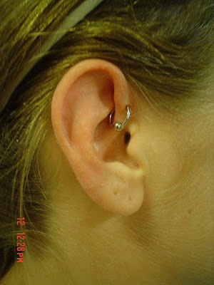 piercing helix. Helix piercings are located in