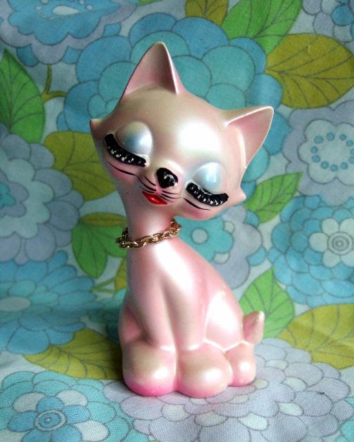 Kitsch and Curious Happiness is a Kitsch Pink Cat