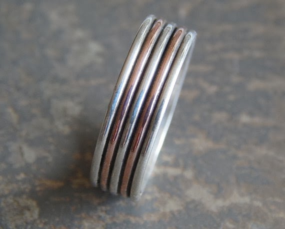 https://www.etsy.com/listing/158921225/dynamic-wedding-band-silver-copper-one?ref=shop_home_active_12