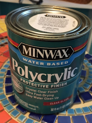 I used Polycrylic on the surface of my work table in my craft room. 