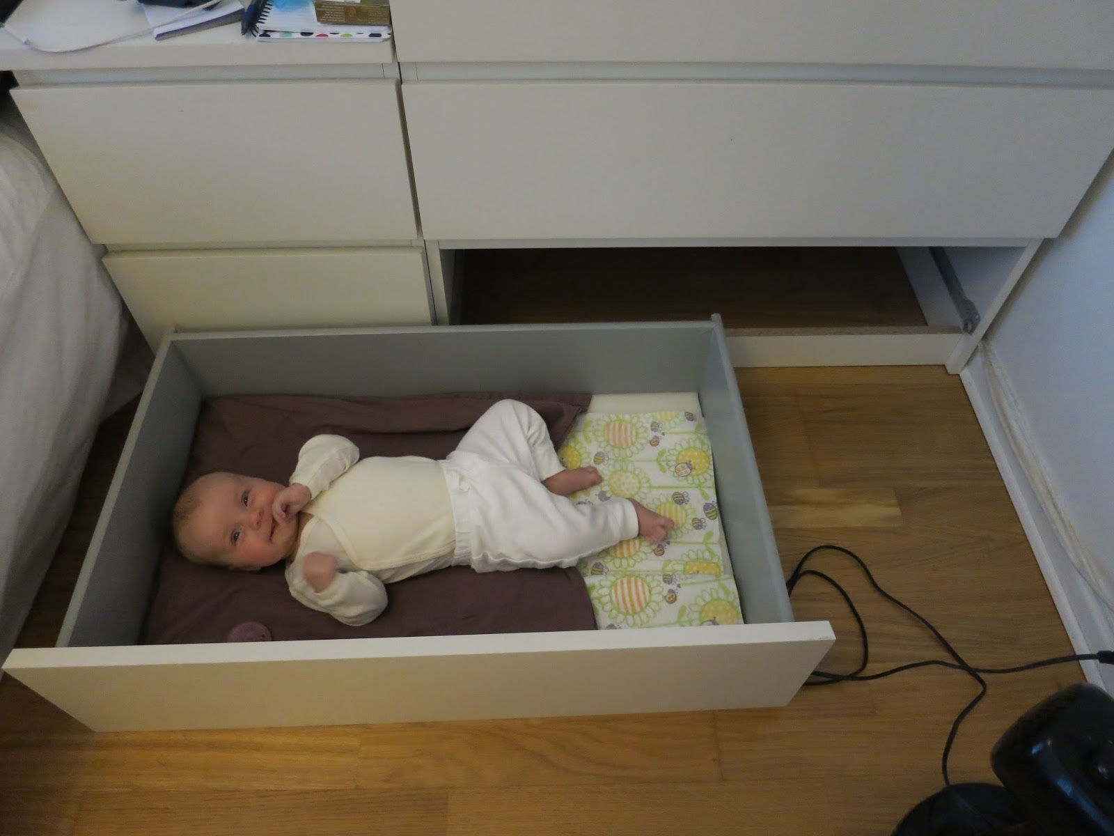 baby in dresser drawer