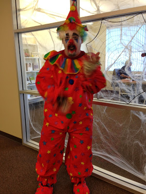 GotPrint employee in clown Halloween costume juggling balls 2013