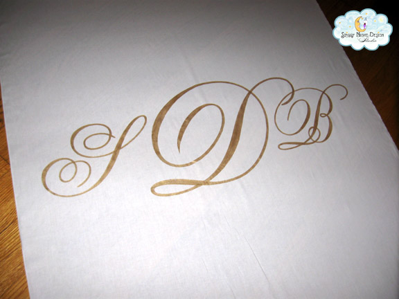 Gold Monogram Aisle runner Sheila wanted a classic monogram painted on the