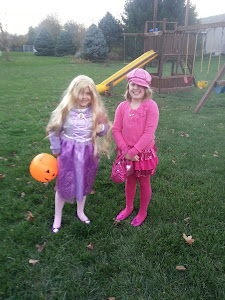 Me and my sister, Lydia at Halloween.  She is Rapunzel and I am Sharpay!