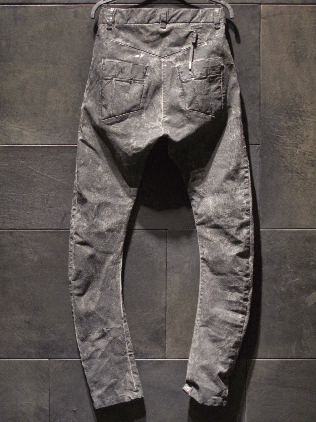 BORIS BIDJAN SABERI SS15 CURVED PRESSED PANTS, VINYL PROCESSED