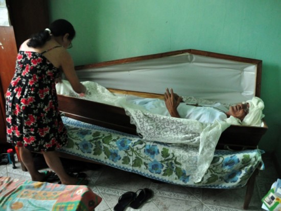 Man Sleeps in Coffin Case
