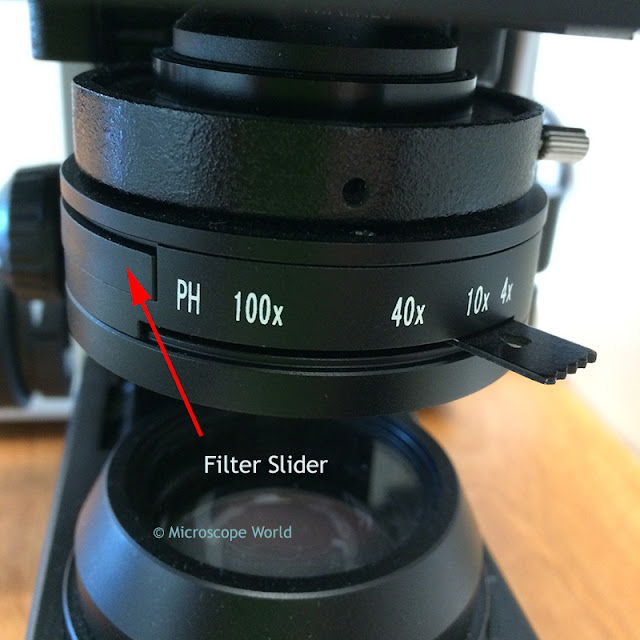 Microscope condenser image with slider inserted.