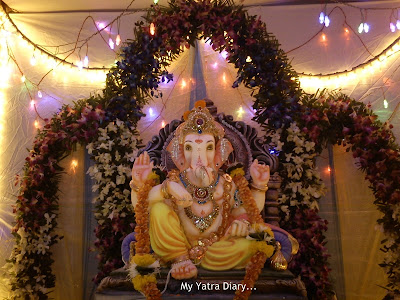 Ganesh Pandal decorated with flowers and plants in Mumbai