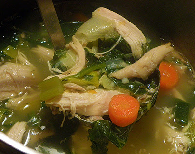 Chicken Soup Being Ladled from Pot