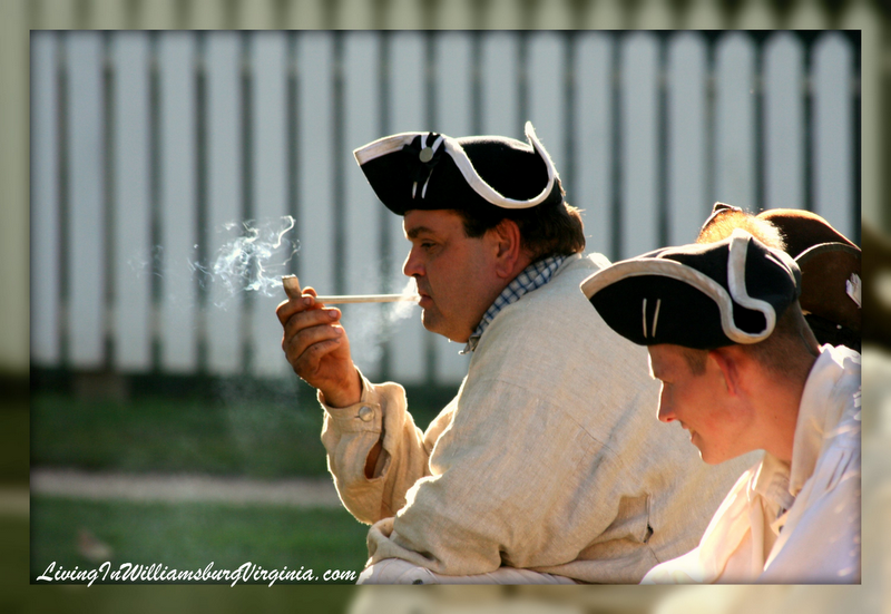 Living In Williamsburg, Virginia Smoking The Clay Pipe In Colonial