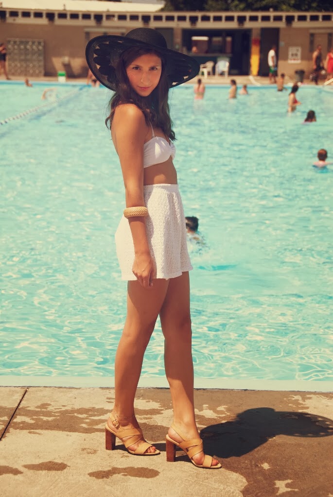 white shorts black floppy hat bikini sandals pool swimwear