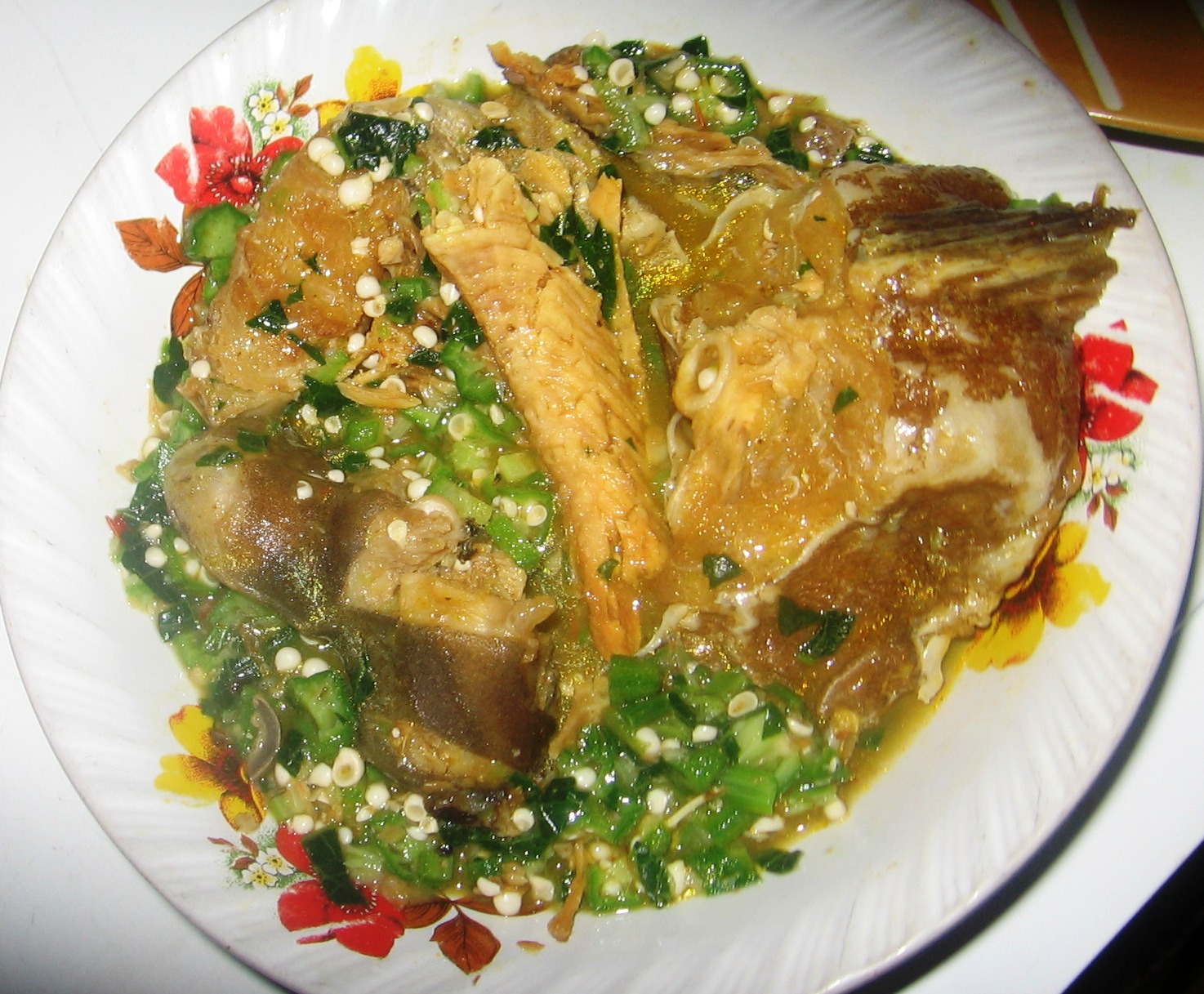 Okra Soup With Goat Meat And Stock Fish Served With Pounded Yam