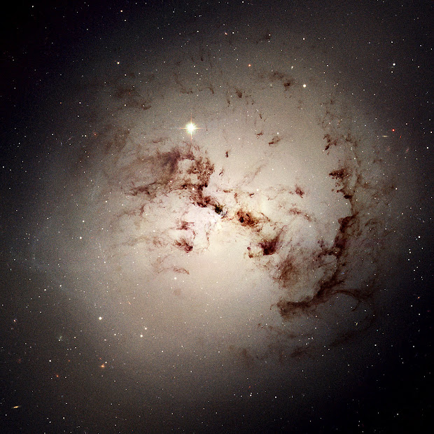 Giant Elliptical Galaxy NGC 1316 brilliantly portrayed by Hubble!