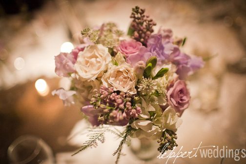 In this April wedding bouquet lavender and royal purple anemones with rich