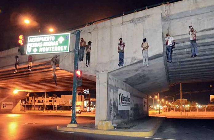 Image result for cartel hanging freeway