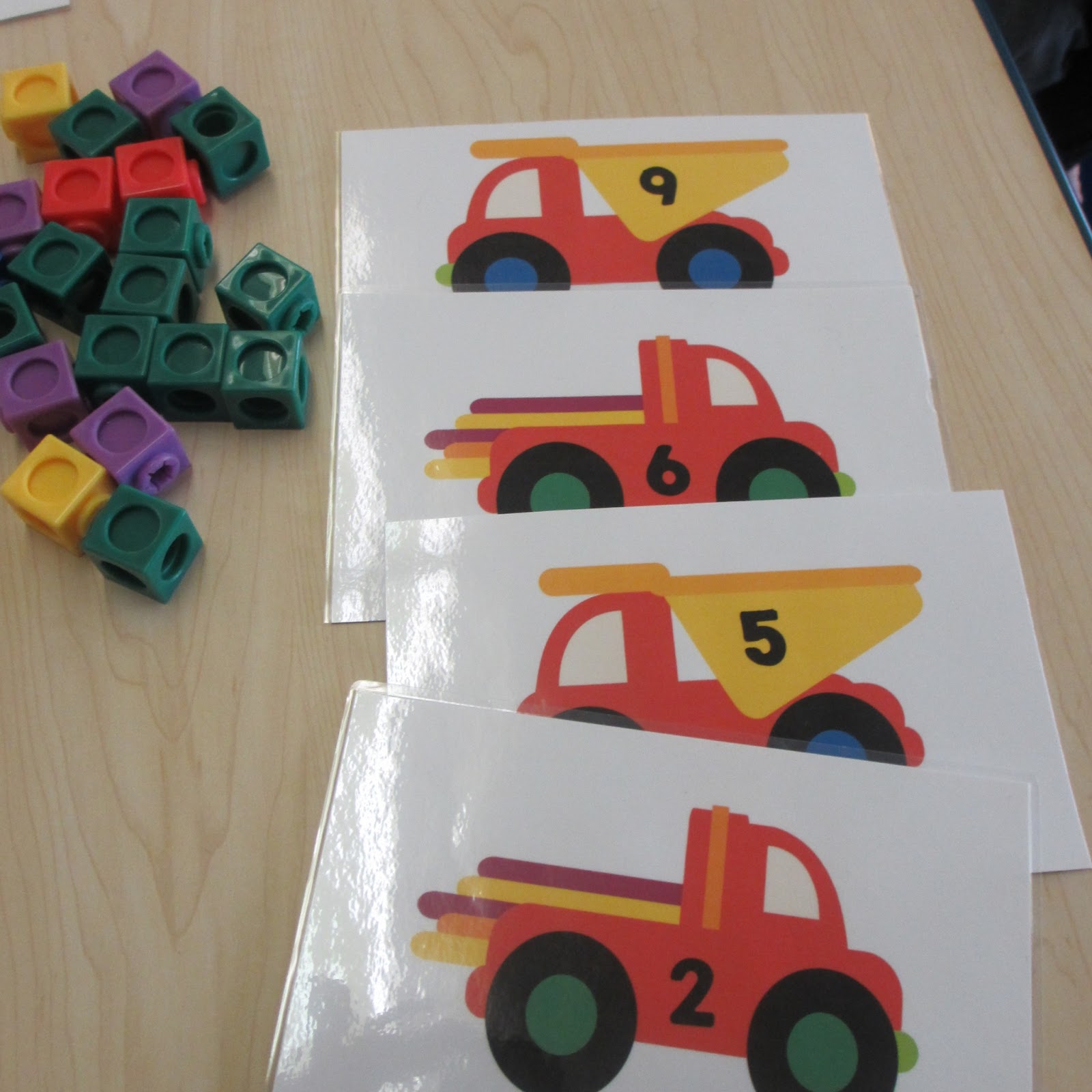 Teaching Munchkins Count & Dump...some math fun with trucks!