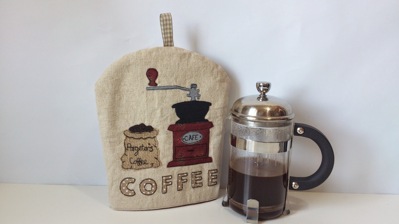 Ruby Patch Coffee Pot Wraps vs Cosies