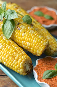 Sweet and tender grilled corn with tomato basil "butter" - vegan recipe