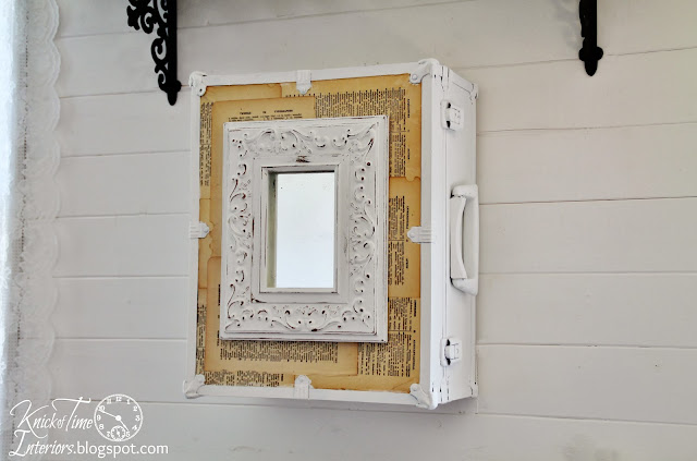 Repurposed Trunk Wall Cabinet by Knick of Time Repurposed Trunk into Wall Cabinet with Dictionary Pages and Framed Mirror by Knick of Time