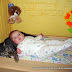 Desensitising the baby to the cat allergen!
