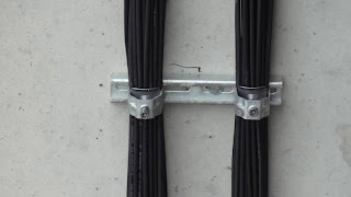 DC Cables on Concrete Pillar