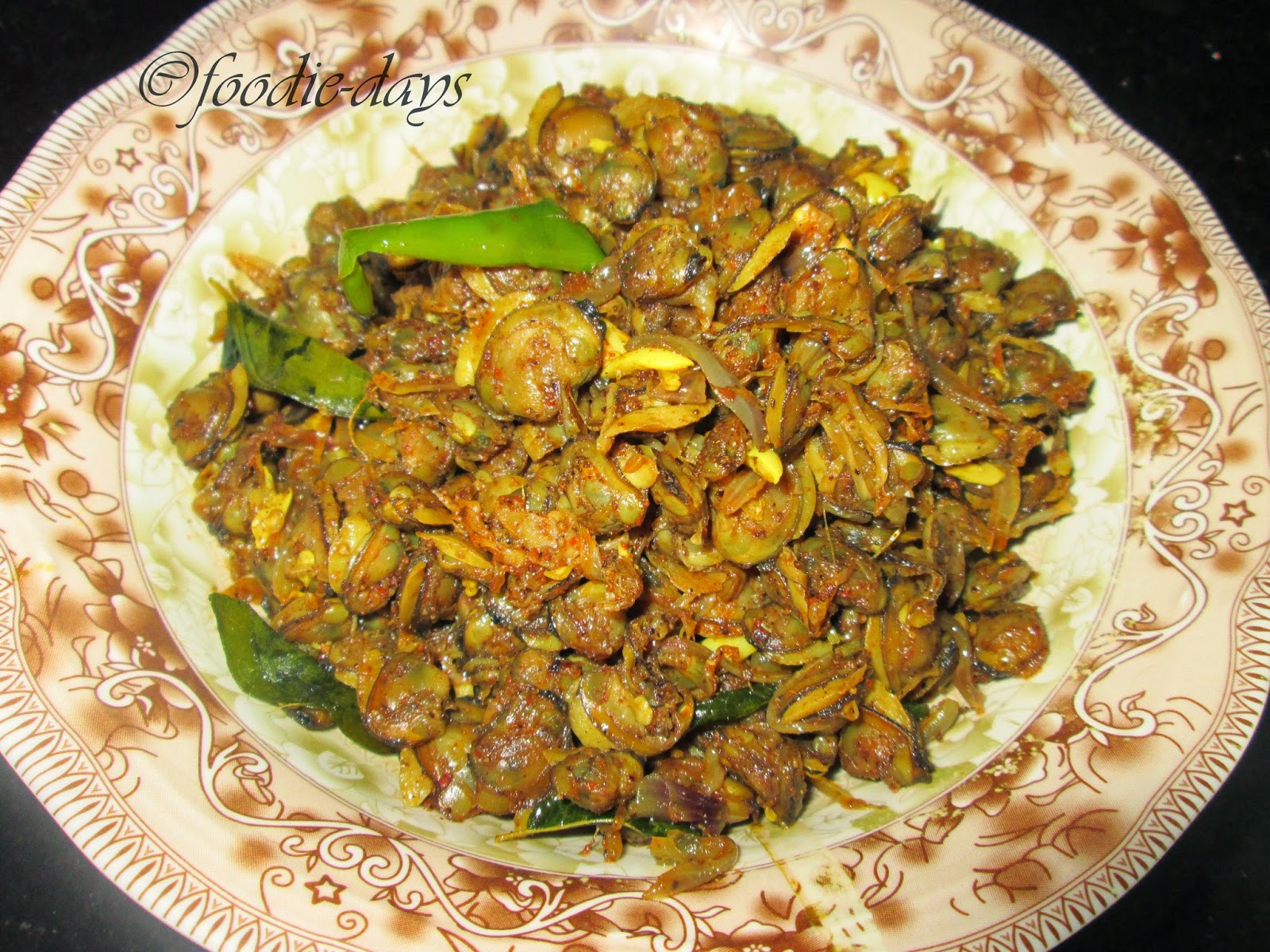 Kakka irachi ularthiyath Kerala style Clam Meat Roast