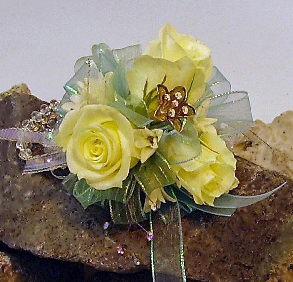 Prom Flowers Prom on the Rocks Roses and Ranunuculus